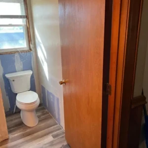 after photo water damaged bath room